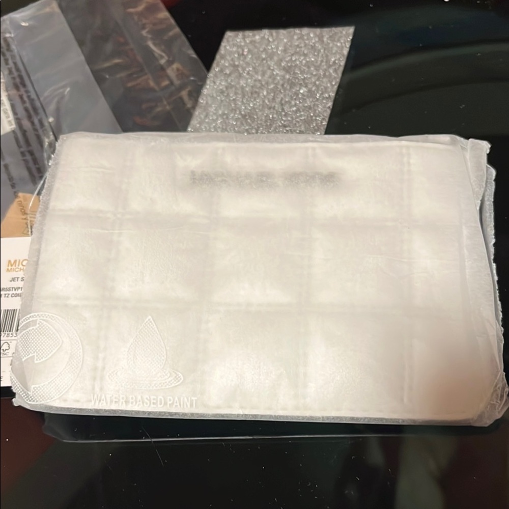 MK. White Quilted Pouch